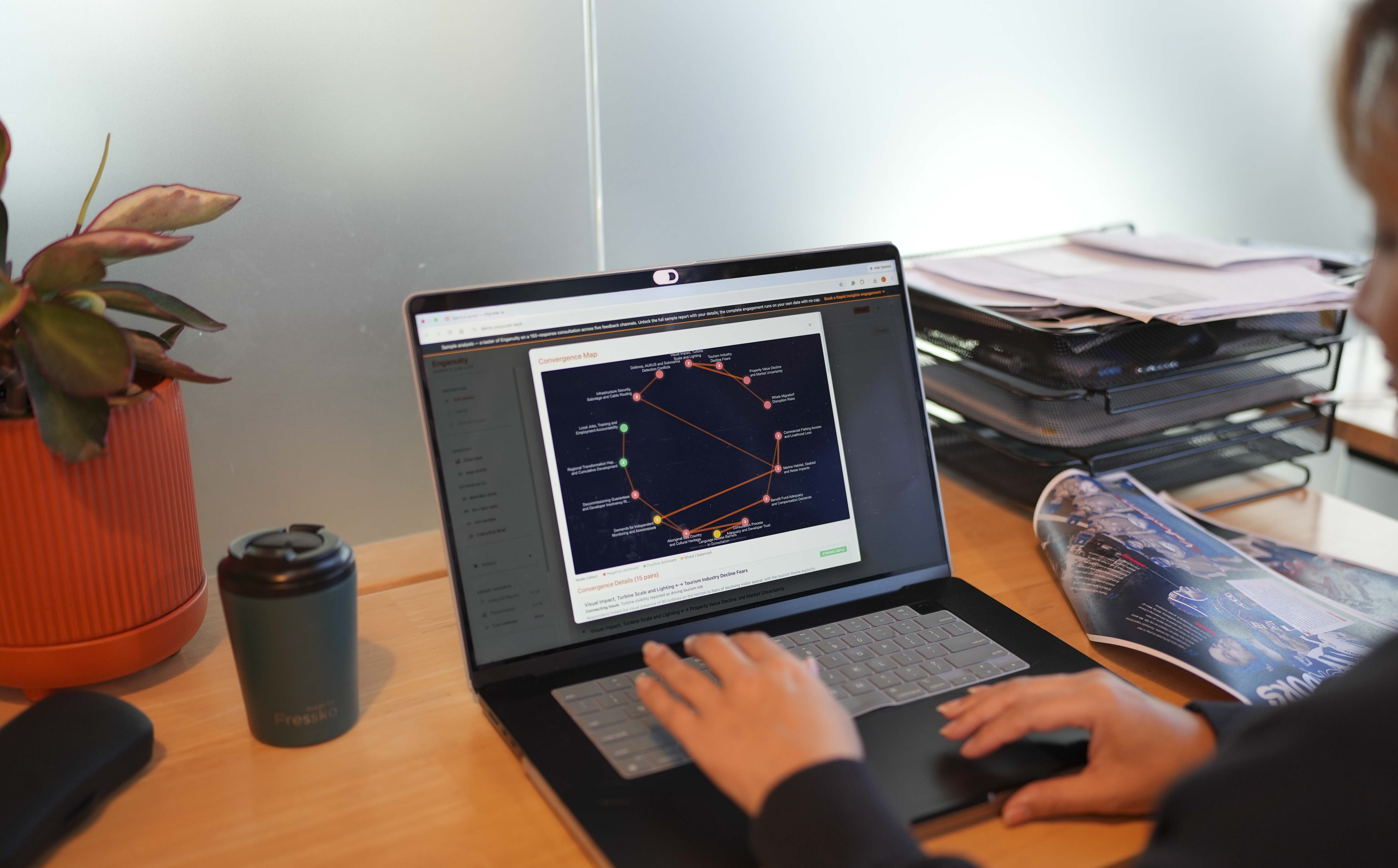Enganuity UI – analysis in progress / topic discovery view.